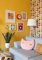 Colourful art and soft furnishings