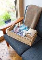 Knitwear in wooden crate
