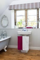 Pedestal sink with towel rail