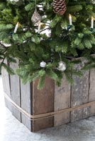 Christmas tree in wooden container