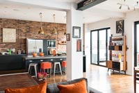 Colourful open plan kitchen and seating area