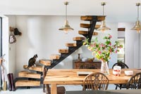 Modern staircase in dining room