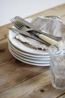 White plates on dining table