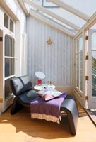 Compact conservatory with chaise longue