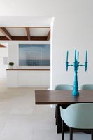 Turquoise candelabra on dining table