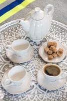 Coffee set on patterned tray