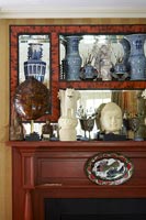 Collectibles displayed on mantlepiece