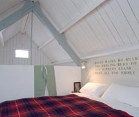 Bedroom in eaves of converted church