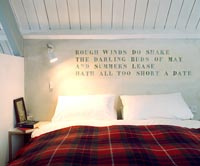 Poetry painted on bedroom wall