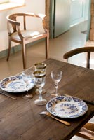 Patterned plates on dining table
