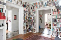 Bookshelves above doorways