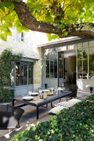 Outside dining area with modern garden furniture