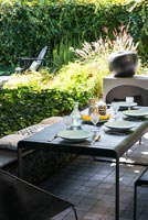 Outside dining area with modern garden furniture