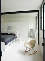 Rocking chair in bedroom