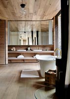 Ensuite bathroom with wooden floor