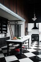 Monochrome kitchen with freestanding island