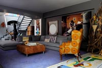 Colourful living room with eclectic art and furnishings