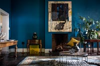 Colourful living room with antique furniture