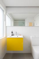 Yellow bathroom cabinet
