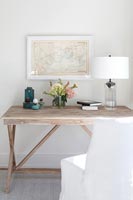 White lamp on wooden table 

