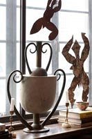 Sculptures and accessories on windowsill