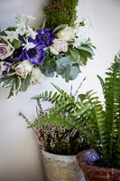 Wreath of Roses and moss with pots of Heather and Ferns