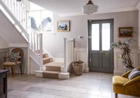 Country hallway with tiled floors