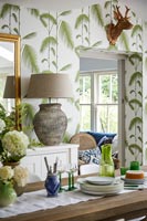 Patterned wallpaper in dining area