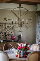 Large candelabra over dining table