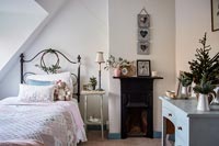 Country bedroom with christmas decorations