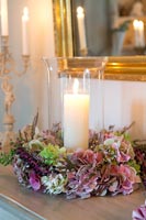 Candle with floral wreath