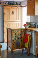 Decorated kitchen cabinet
