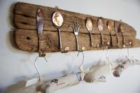 Wooden hook rack made from old cutlery