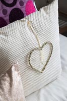 Cushion with heart detail