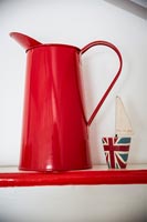 Red tin jug