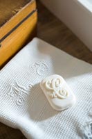 Embroidered cloth and decorative soap detail