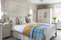 Country bedroom with colourful bedding
