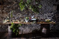 Food displayed on a rustic wooden serving table 