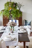 Classic dining room with decorative foliage 