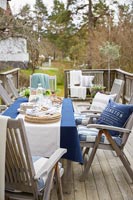 Outside table and chairs ready for entertaining