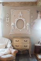 Vintage chest of drawers and wall decoration