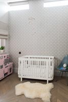 Modern cot in nursery