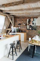 Kitchen with exposed beams