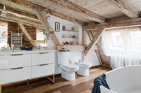 Bathroom with wooden exposed beams