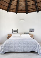 Bedroom with thatched roof