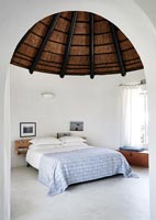 Bedroom with thatched roof
