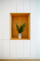 Foliage on display in recessed wall niche