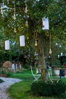 Lanterns and decorations hanging in the garden