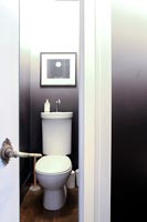 Cloakroom with white toilet