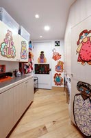 Modern kitchen with artworks